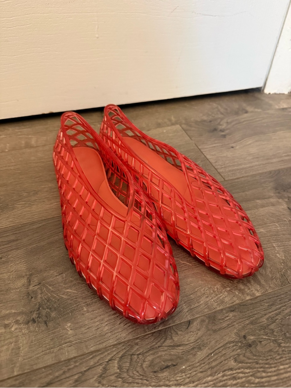 Red Lucky Step jelly flats with woven lattice design